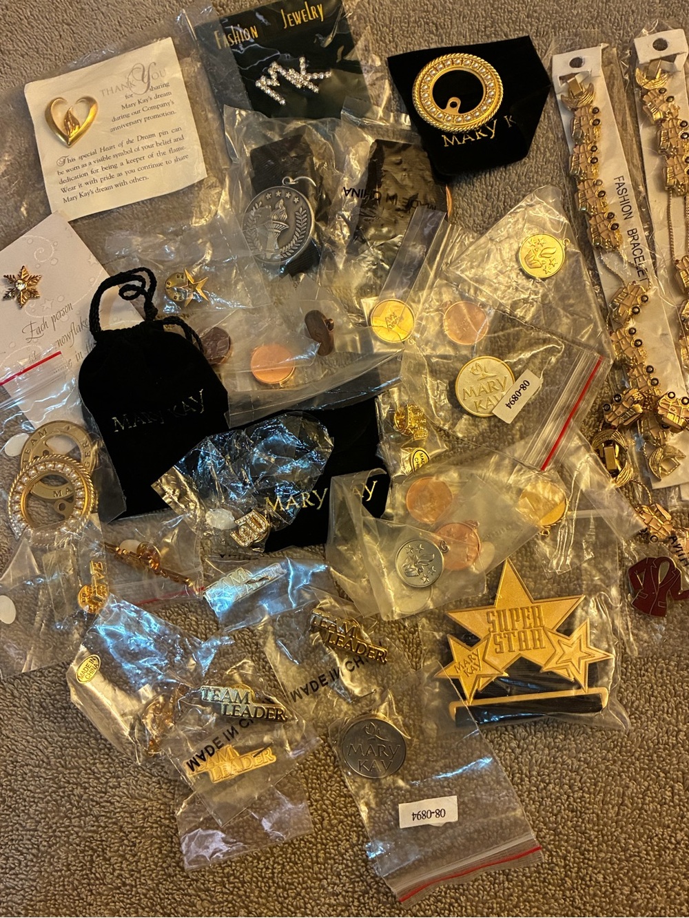 39 pc Mary Kay Award Pins, Medals, Charms and Bracelets